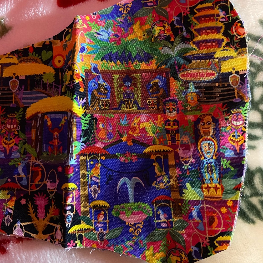 Disney tiki room face mask olson